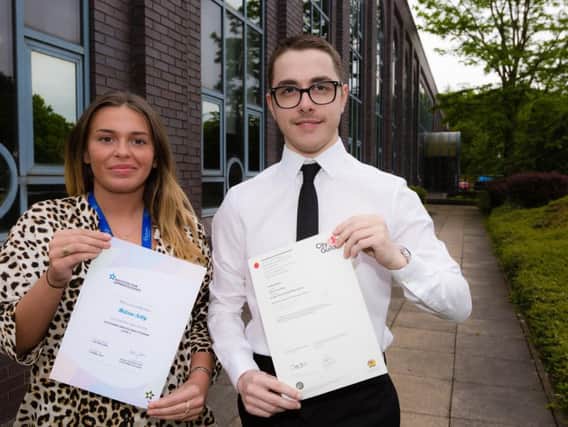 Melissa Selby and Callum Loveridge with their certificates: