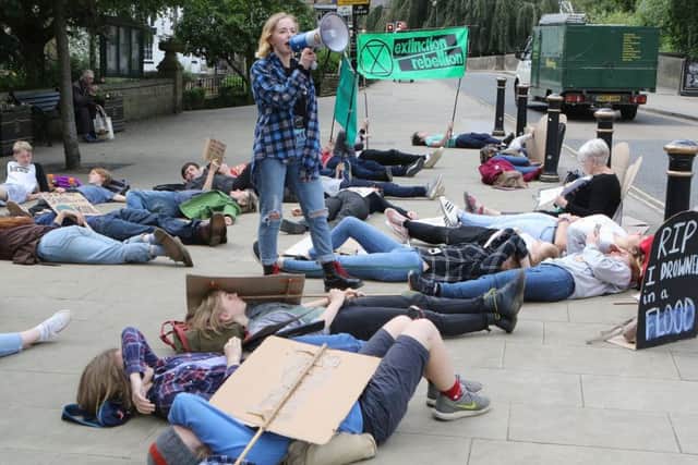 A recent climate change protest held in Matlock's Crown Square. Photo: Jason Chadwick.