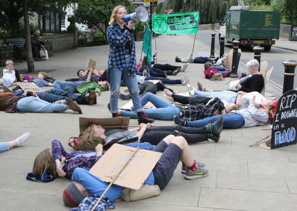 A recent climate change protest held in Matlock's Crown Square. Photo: Jason Chadwick.