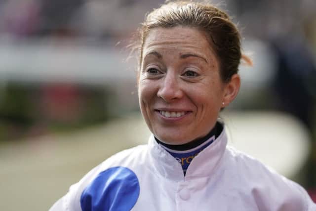 Hayley Turner is all smiles after becoming the first female jockey to ride a winner at Royal Ascot for 32 years. (PHOTO BY: Alan Crowhurst/Getty Images)