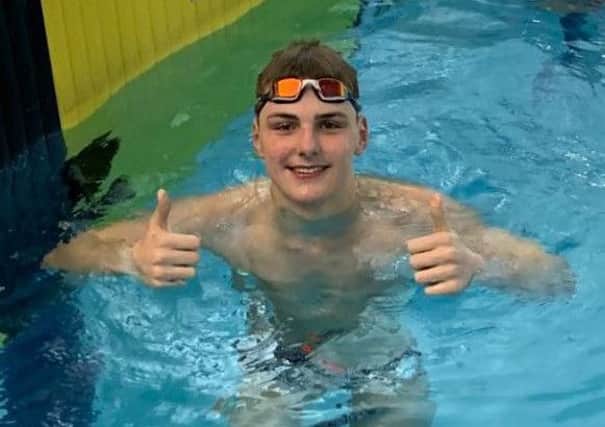 Thumbs up from record-breaking swimmer Jacob Whittle. (PHOTO BY: Duncan McLean)