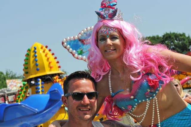 Tanya West leaves the Warrior float to join up with Glen Gent.
