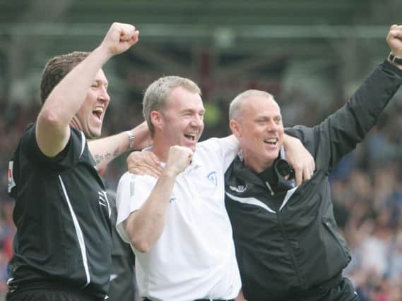 Mark Crossley celebrating previous success at Chesterfield with John Sheridan