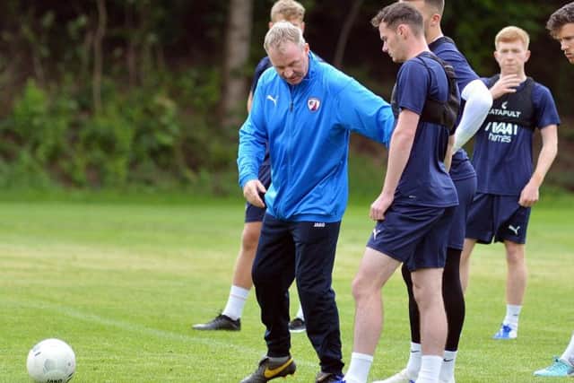 John Sheridan will put the players through their paces in front of fans