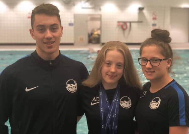 Successful swimmers Jack Blair, Amber Downham and Chloe Stennett.