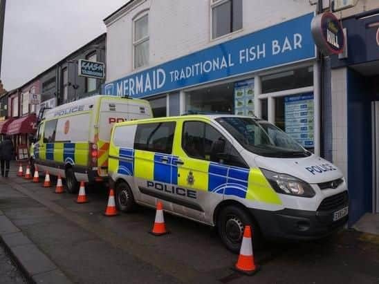 Police outside the Mermaid Traditional Fish Bar on Sheffield Road in Chesterfield in December 2017.