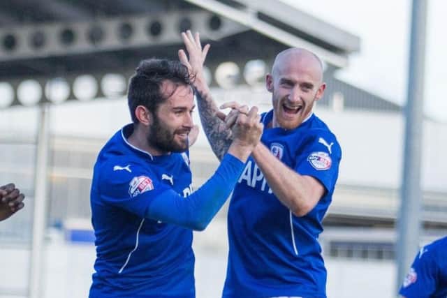 Talbot celebrates a Sam Hird goal