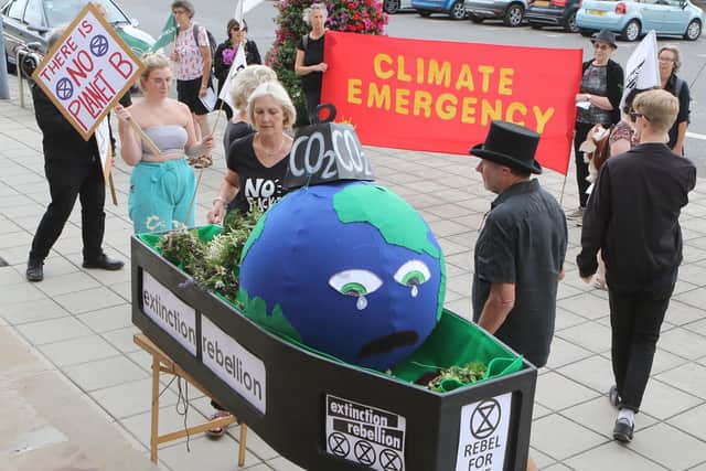 Climate change campaigners in Chesterfield before the council debate.