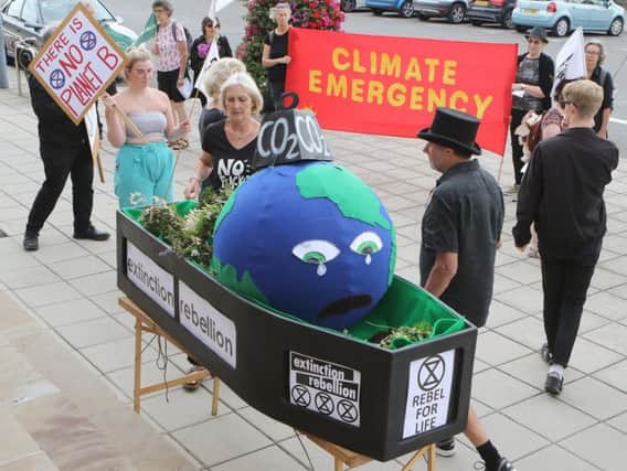 Climate change campaigners from Extinction Rebellion at Chesterfield Town Hall on Wednesday.