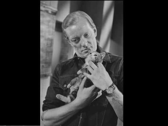 British actor Jeremy Kemp holding a kitten as he stars in the action thriller television series 'The Protectors', UK, 23rd April 1964. (Photo by Larry Ellis/Daily Express/Hulton Archive/Getty Images)