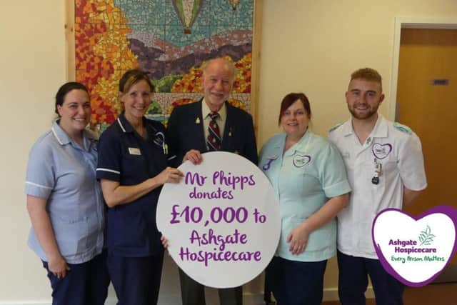 Chesterfield man Michael Phipps, centre, donates 10,000 to Ashgate Hospicecare staff in memory of his wife April