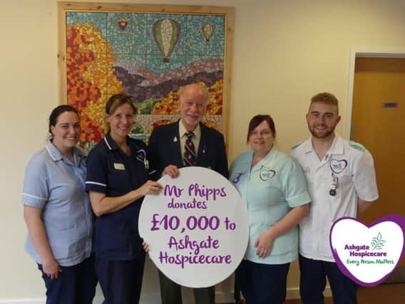 Chesterfield man Michael Phipps, centre, donates 10,000 to Ashgate Hospicecare staff in memory of his wife April