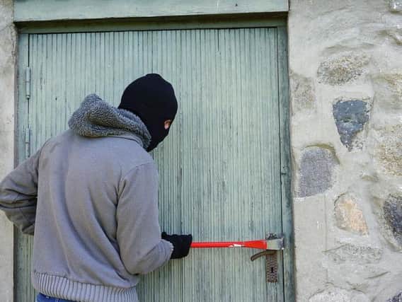 A man has been charged with eight counts of burglary. Stock image.