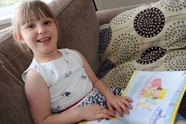 Grace Thompson, 4, has been diagnosed with Batten Disease.