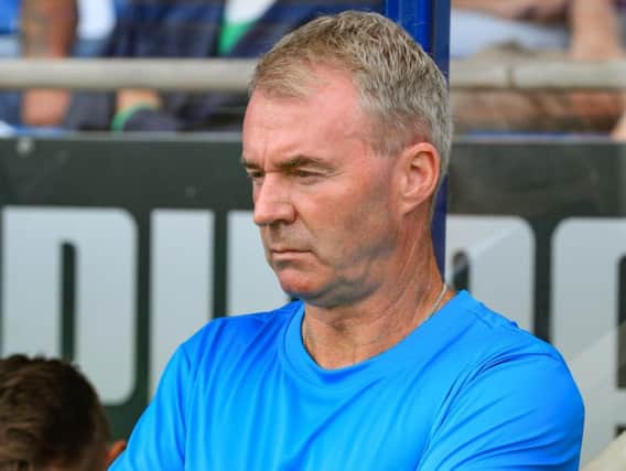 John Sheridan watches on against Dover.