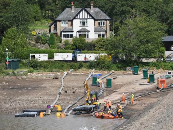 Teams working at the reservoir on Monday. Photo -  Anthony Devlin/Getty Images