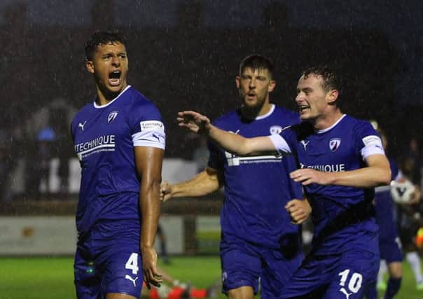 Chesterfield's Josef Yarney celebrates his goal in front of the travelling fans.