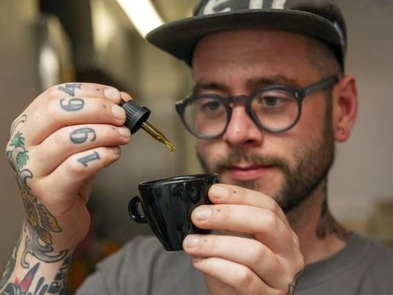 Ben Stevenson adds a touch of cannabis to a cuppa at Starbuds.