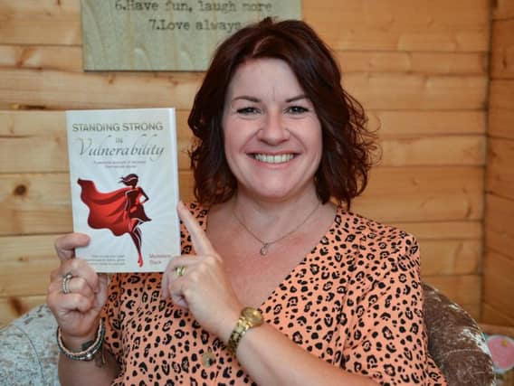 Madeleine Slack with her new book. Picture by Rachel Atkins.