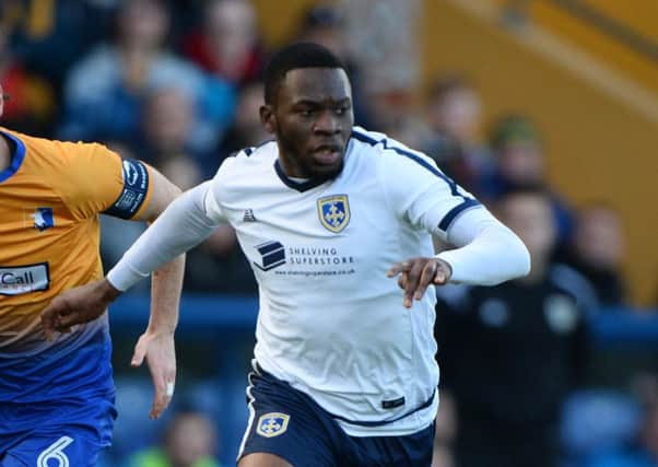 MANSFIELD, ENGLAND - DECEMBER 03: Mike Fondop-Talom of Guiseley in action during The Emirates FA Cup Second Round match between Mansfield Town and Guiseley at One Call Stadium on December 3, 2017 in Mansfield, England. (Photo by Nathan Stirk/Getty Images)