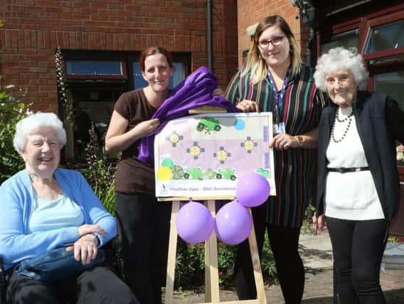Residents Barbara Lane and Eunice Ripley with Donna Burns and Rebecca Lomas, staff at the care home. Picture by Jason Chadwick.