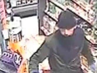 Police release CCTV images after Chesterfield petrol station knifepoint robbery