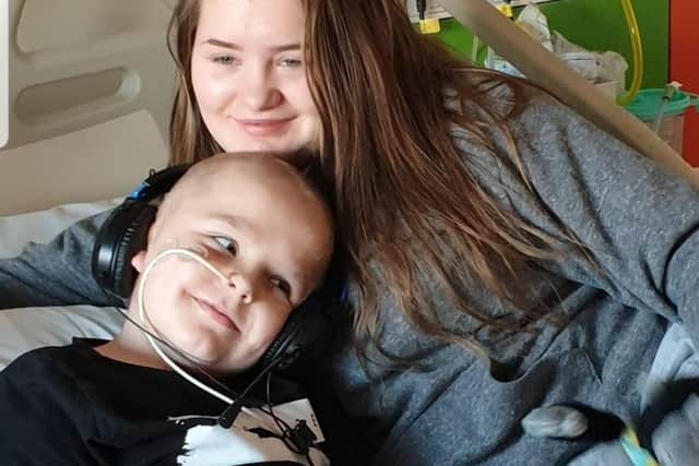 Sam and older sister Katie during treatment at Sheffield Children's Hospital
