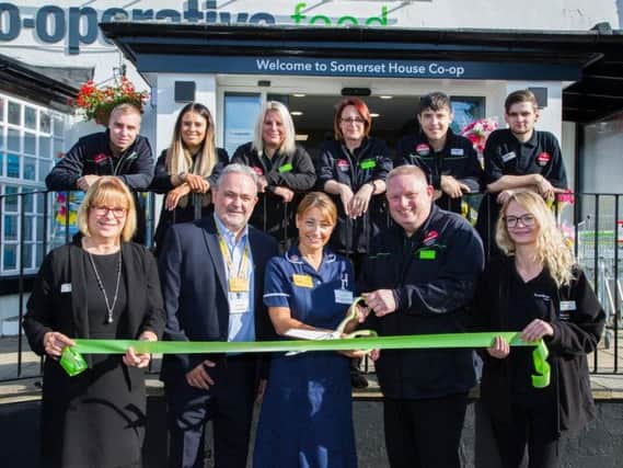 Royal Hospital staff join in the celebrations at Calow's new Co-op.