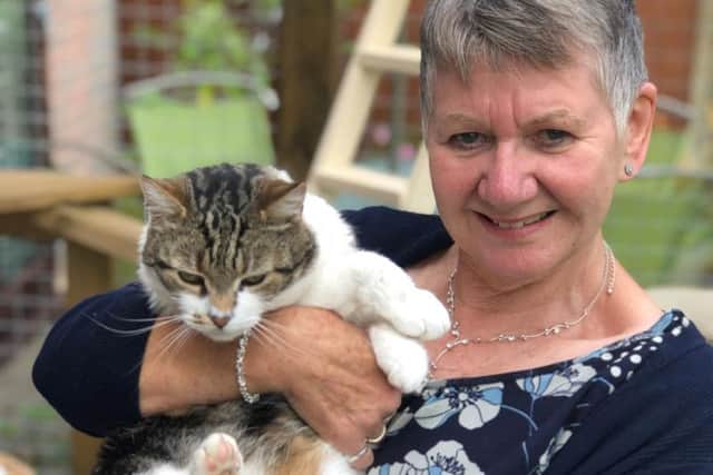 Chesterfield woman Thelma Reddish with her pet cat Hamilton.