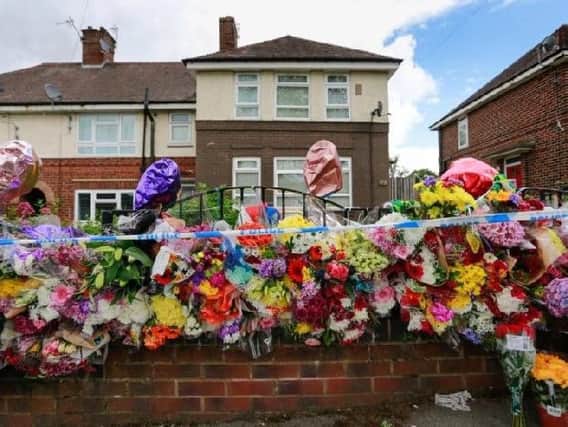 Floral tributes were left at the scene