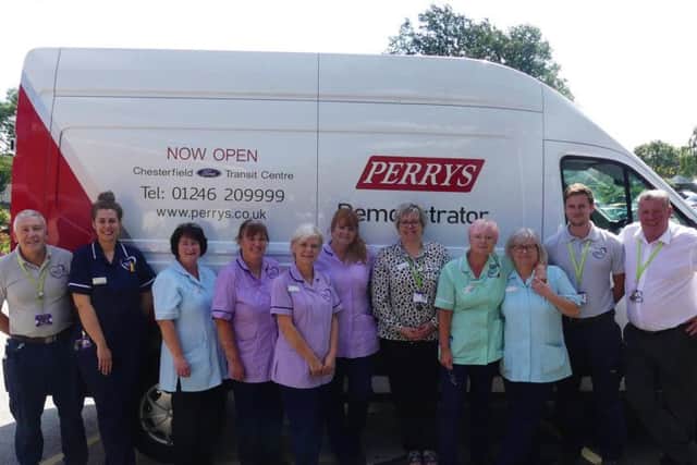 Staff from Chesterfield's Ashgate Hospicecare take delivery of their new Ford Transit van from Perry's Ford in the town.