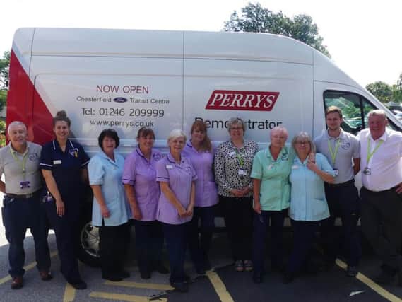Staff from Chesterfield's Ashgate Hospicecare take delivery of their new Ford Transit van from Perry's Ford in the town.