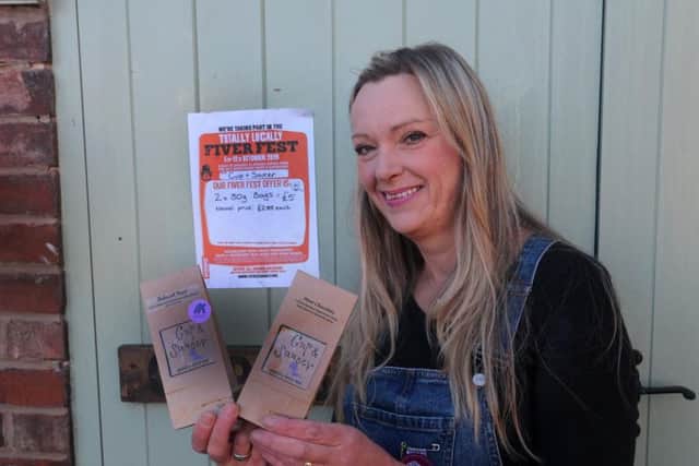 Organiser of the event, Gail Hannan, is selling two packets of teas for a fiver.