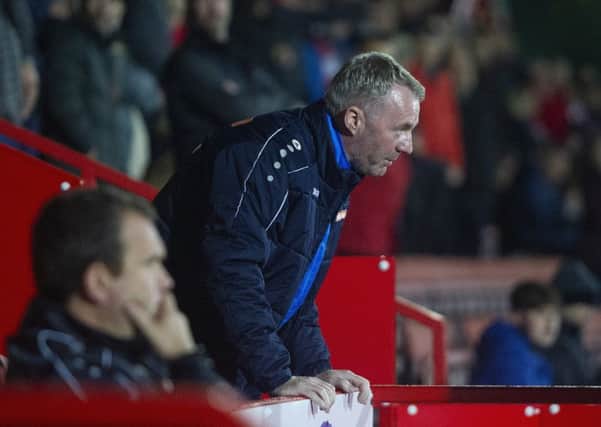 Picture Greg Dunbavand/AHPIX LTD, Football, National League, Wrexham v Chesterfield, Racecourse Ground, Wrexham, UK, 15/10/19, K.O 7.45pmChesterfield manager John Sheridan watches on as his side visit Wrexham.Howard Roe>07973739229