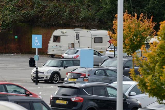 Travellers in the Chesterfield Sainsbury's car park.