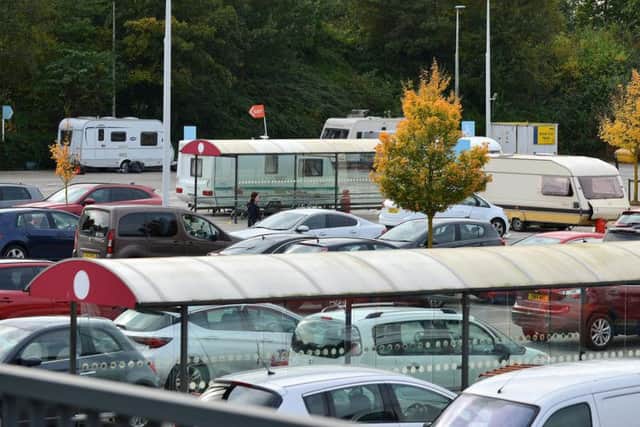 Travellers in the Chesterfield Sainsbury's car park.