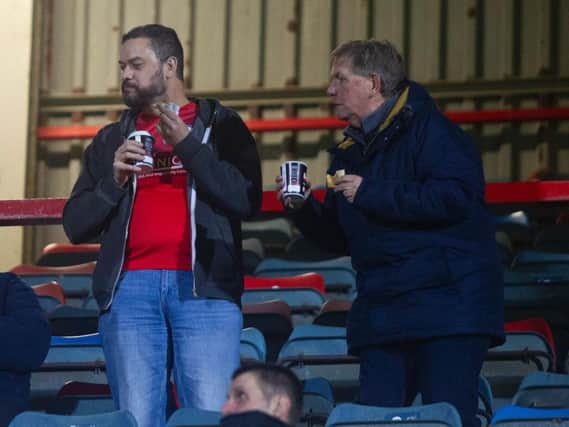 These Spireites fans watched their team lose 1-0 at Wrexham in the FA Cup last night.