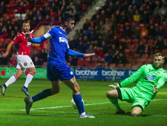 Wrexham beat Chesterfield 1-0 in the FA Cup fourth qualifying round last night.
