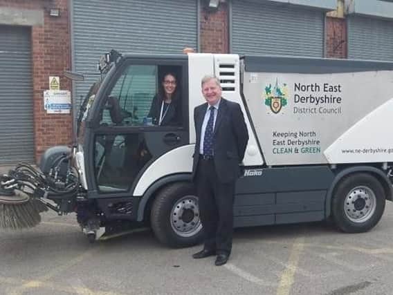 Councillor Martin Thacker, leader of North East Derbyshire District Council, and Councillor Charlotte Cupit, cabinet member for the environment, with one of the new road sweepers. Picture posted on Twitter.