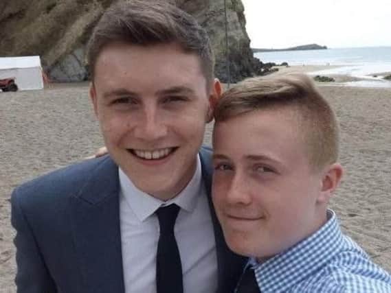 Joe Robinson, right, said a defibrillator was used on his older brother Tom Henson - but he was concerned many people might not know where their nearest device was. Picture submitted.