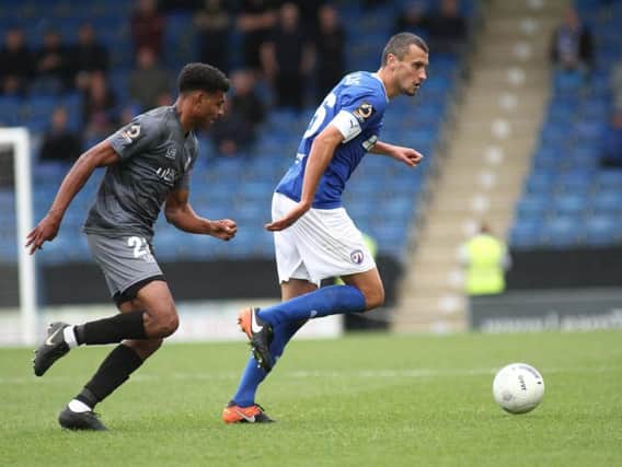 Chesterfield defender Haydn Hollis says the Spireites can still make the National League play-offs.