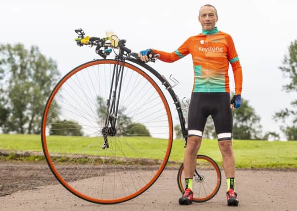 Intrepid cyclist Richard Thoday, of Matlock, with the penny-farthing bike that helped him break the record. (PHOTO BY: Katielee Arrowsmith, SWNS)