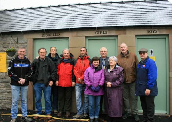 Parish councillors and local residents at the opening of the new toilet block in Youlgrave.