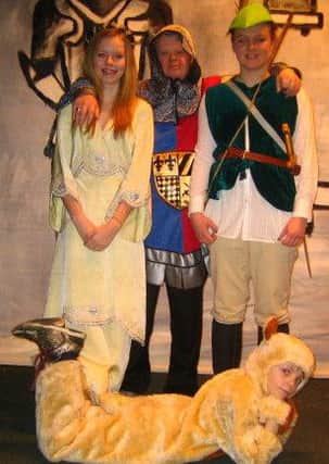 Molly Watts (Maid Marion); Chris Watson (Soldier); Chloe Arbury (Robin Hood) , left to right on back row, with George Watts (Bo-Bo) in Tansley Players production of Babes in the Wood.