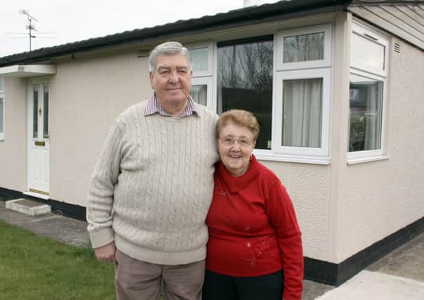 Peter and Beryl Barraclough outside their prefab home in Killamarsh