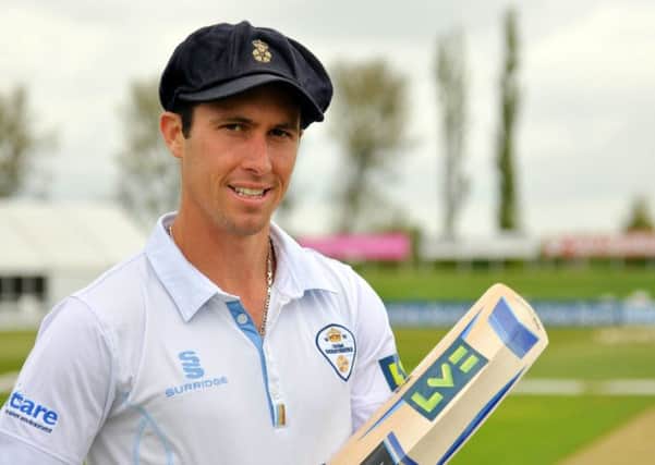 Derbyshire's Wayne Madsen displaying his LV= bat sticker in aid of charity