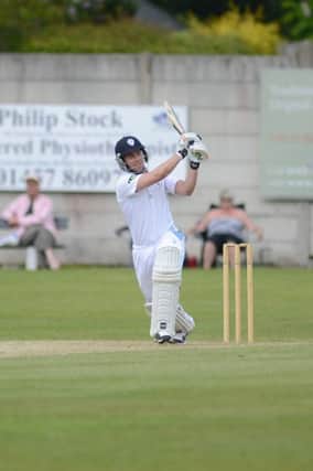 Derbyshire CC 2nds v Lancashire at Glossop, Derbyshire's Hughes hits one to the boundary