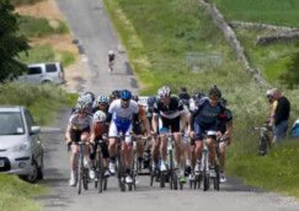 Cyclists from across the country pit their fitness against the tough route of the 2013 High Peak Road Race.
