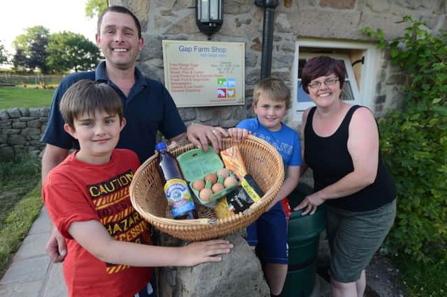 Opening a shop in Warslow for the first time in  many years, Darren and Liz Barlow with their sons Oliver and Joshua