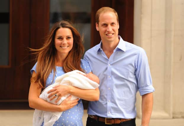The Duke and Duchess of Cambridge leave the Lindo Wing of St Mary's Hospital in London, with their newborn son. PRESS ASSOCIATION Photo. Picture date: Tuesday July 23, 2013. See PA story ROYAL Baby. Photo credit should read: Dominic Lipinski/PA Wire